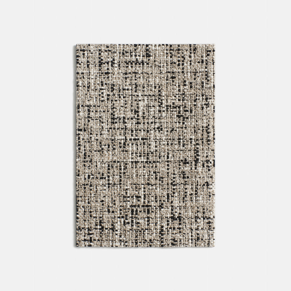 Discover Dedar Milano Hurluberlu, a water-repellent Italian macro tweed upholstery fabric made with linen, wool, and cotton. A durable artisanal textile for intensive upholstery and luxury interiors.