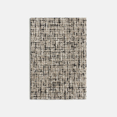 Discover Dedar Milano Hurluberlu, a water-repellent Italian macro tweed upholstery fabric made with linen, wool, and cotton. A durable artisanal textile for intensive upholstery and luxury interiors.