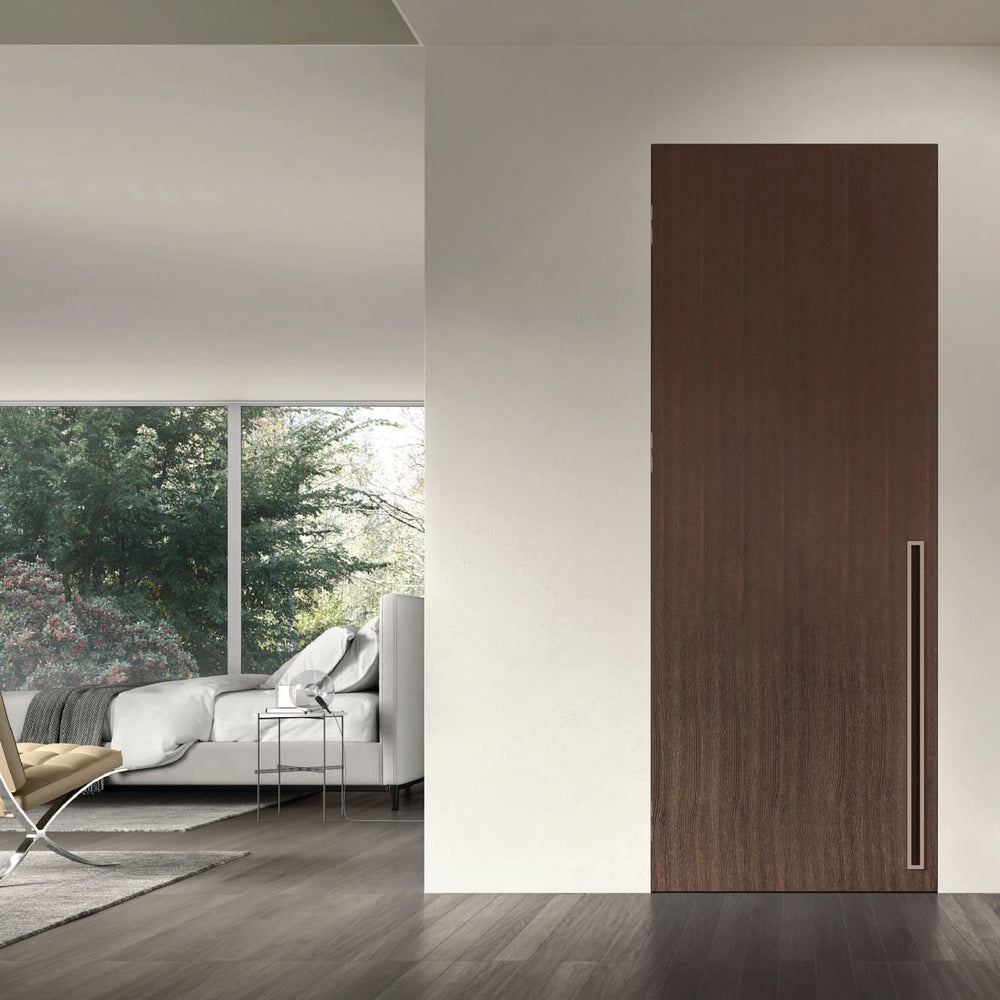 Bluinterni Italian architectural door in a minimalist interior. Visit the Archideco showroom in Riga.