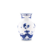 A classic blue and white porcelain vase featuring hand-painted floral and landscape motifs, set against a solid white background.