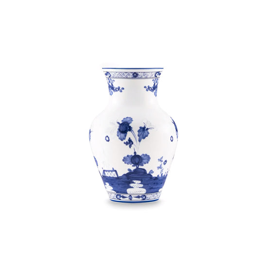 A classic blue and white porcelain vase featuring hand-painted floral and landscape motifs, set against a solid white background.