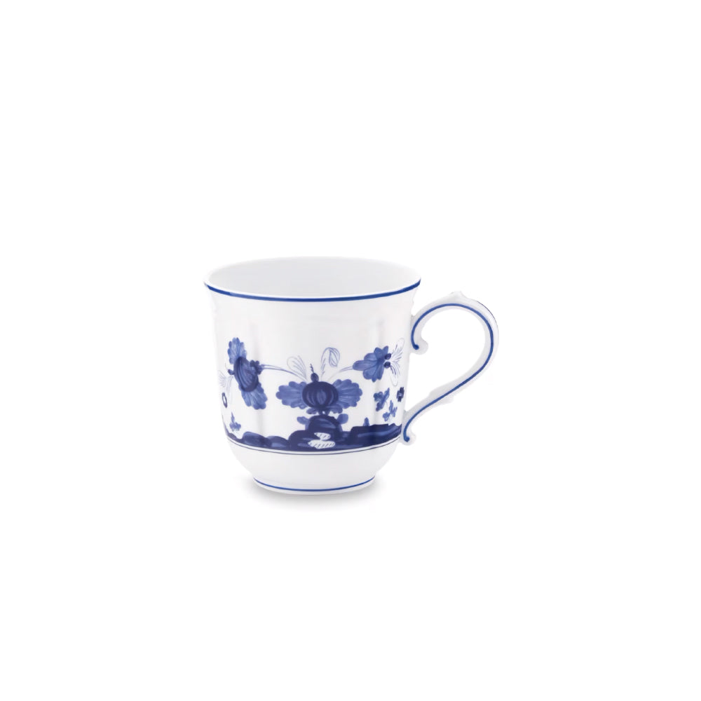 Anchor your tea ritual with the Ginori 1735 Oriente Italiano Indaco teapot, handcrafted in Sesto Fiorentino, Italy. Sculpted in the archival Antico Doccia shape, this pure Italian porcelain centerpiece showcases an intricate indigo-blue botanical motif blooming across a luminous white surface, uniting classical Florentine ceramic heritage with an evocative, Far Eastern-inspired garden aesthetic.