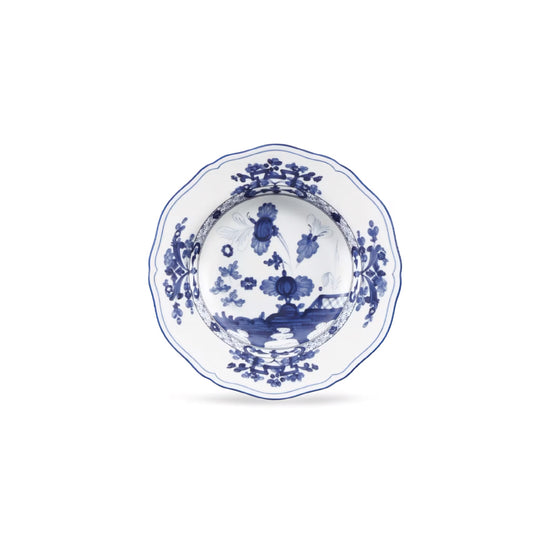 A white ceramic bowl with a blue hand-painted traditional landscape design, featuring a scalloped rim, shown against a plain white background.