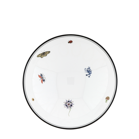 A white ceramic plate with a black rim, decorated with various colorful illustrations including butterflies, a ladybug, flowers, and small insects, shown from a top-down view on a white background.