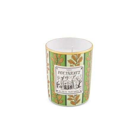 Enter a mysterious woodland escape with the Fox Thicket Folly Scented Candle from the Profumi Luchino Collection by Ginori 1735, created in collaboration with British artist and designer Luke Edward Hall. Inspired by a dramatic Gothic building hidden within a fog-covered forest, this luxury home fragrance captures the atmosphere of Fox Thicket Folly and the enchanting landscapes of the Cotswolds, England, one of the artist’s favorite destinations.