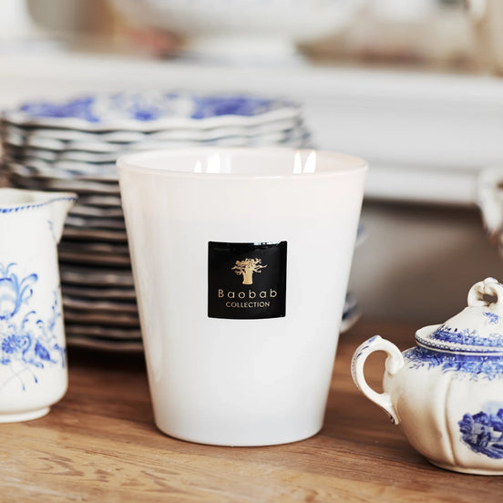 Baobab Collection Pierre de Lune scented candle from the Les Prestigieuses Collection. Fresh floral fragrance with mint and verbena in an elegant decorative glass vessel. Max 10 size with four cotton wicks for refined home fragrance and sophisticated interiors. Archideco Interior Gallery | archideco-interior.com