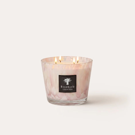 Limited edition Baobab Collection White Pearls scented candle with hand-blown pearlescent glass and a delicate floral fragrance of orchid petals and freesia. Available in Max 10 and Max 16 sizes for elegant home fragrance and timeless interior décor. Archideco Interior Gallery | archideco-interior.com
