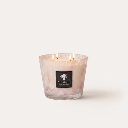 Limited edition Baobab Collection White Pearls scented candle with hand-blown pearlescent glass and a delicate floral fragrance of orchid petals and freesia. Available in Max 10 and Max 16 sizes for elegant home fragrance and timeless interior décor. Archideco Interior Gallery | archideco-interior.com