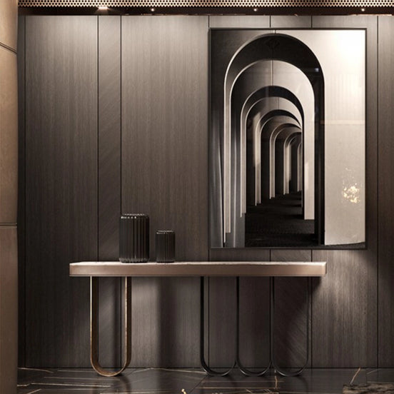 Defined by a sleek marble top resting on a rhythmic composition of slender looped metal legs, Iris transforms a functional silhouette into a sculptural statement. The airy U-shaped bases — rendered in contrasting dark and brushed gold finishes — create a sense of weightlessness and movement beneath the solid stone surface. Noble materials including marble and metal are brought together with balance and precision, reflecting Medea's commitment to harmonious design and meticulous artisan execution.