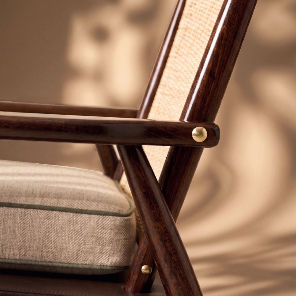 The Eloisa Chair by Medea 1905, designed as part of the Tara Bernerd for Medea 1905 Collection, brings together a sculptural wooden frame, a naturally woven straw backrest, and tactile leather upholstery to create a distinctive expression of contemporary Italian craftsmanship.