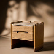 The Jacques Bedside Table by Medea 1905, designed as part of the Tara Bernerd for Medea 1905 Collection, combines architectural simplicity with sophisticated material detailing and a distinctly crafted character.