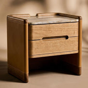 The Jacques Bedside Table by Medea 1905, designed as part of the Tara Bernerd for Medea 1905 Collection, combines architectural simplicity with sophisticated material detailing and a distinctly crafted character.