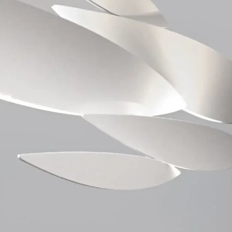 Terzani I Lucci Argentati linear chandelier by Dodo Arslan, with sleek fish-inspired light elements suspended in a bright contemporary interior.