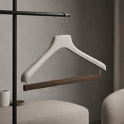 Hanger for shirts, polos and pullovers with a velvet covered bar for trousers
