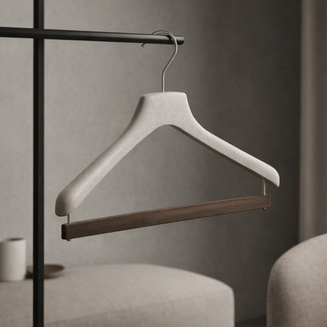 Hanger for shirts, polos and pullovers with a velvet covered bar for trousers