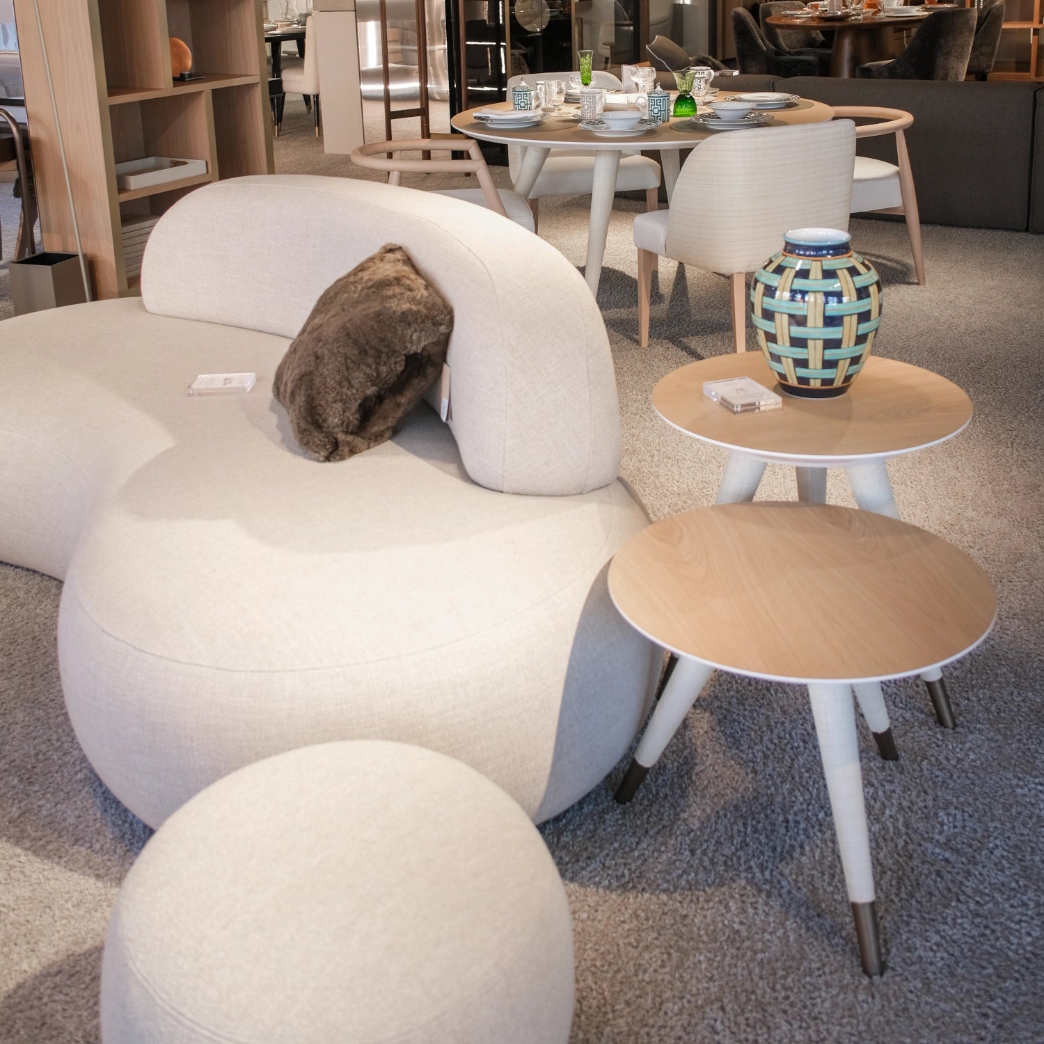 Bombo Pouf, Doem sofa, Cupertino table, Ginori 1735 vase by Dom Edizioni at Archideco Interior Gallery