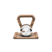 PENT. LOVA™ kettlebell with a wooden stand